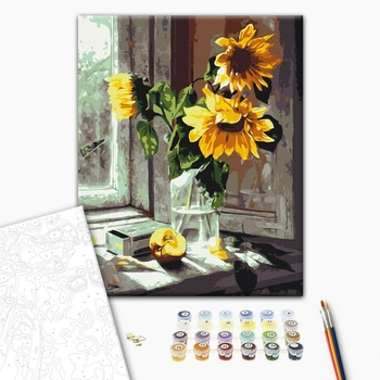 Букет соняхів у вікні